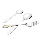 Three-piece silver cutlery set featuring one gold-accented handle, displayed on a plain white background.